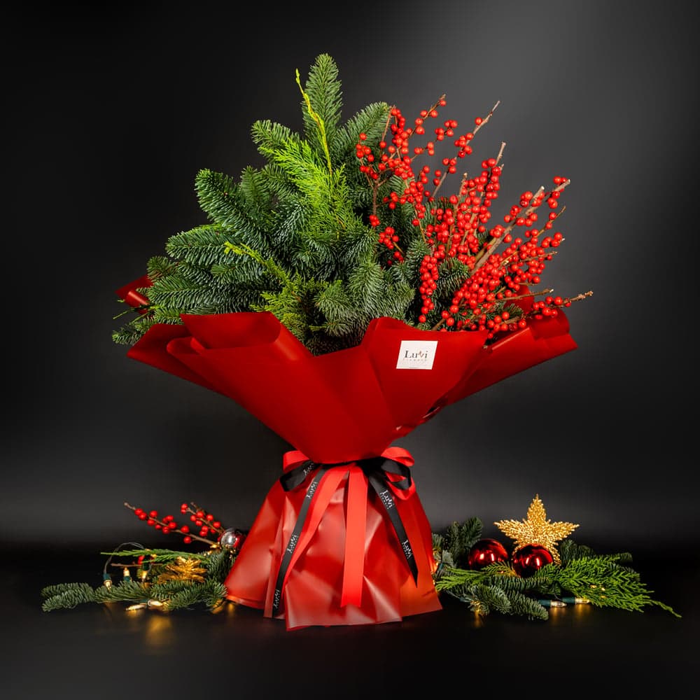 Medium-sized Berry Pine arrangement showcasing a festive blend of red ilex and berry pine	 thumbnail