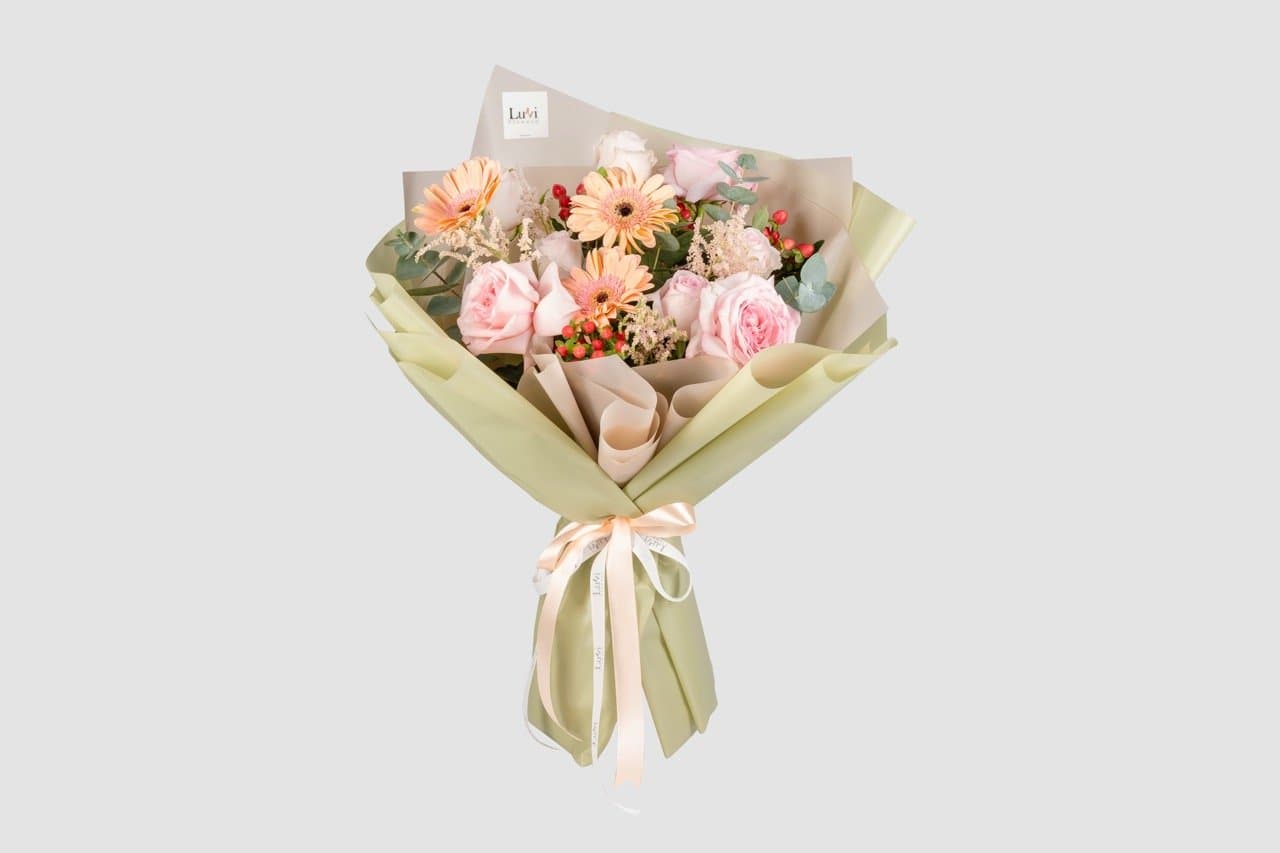 Medium Pastel Whimsy bouquet with a mix of pink and peach flowers	