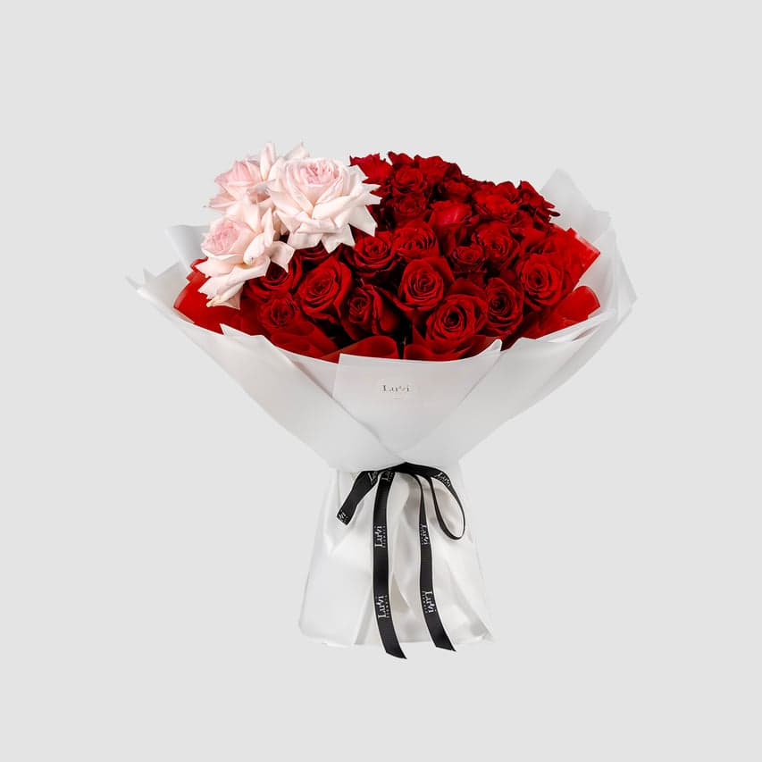 Large Lover’s Rose bouquet with O'Hara roses. 