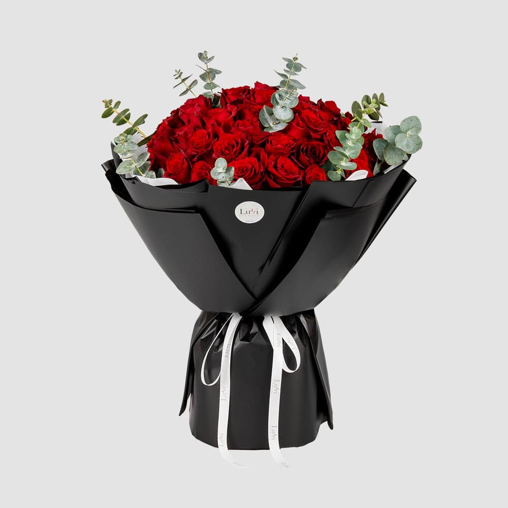 Small Forever Yours bouquet with a sleek black wrap. thumbnail