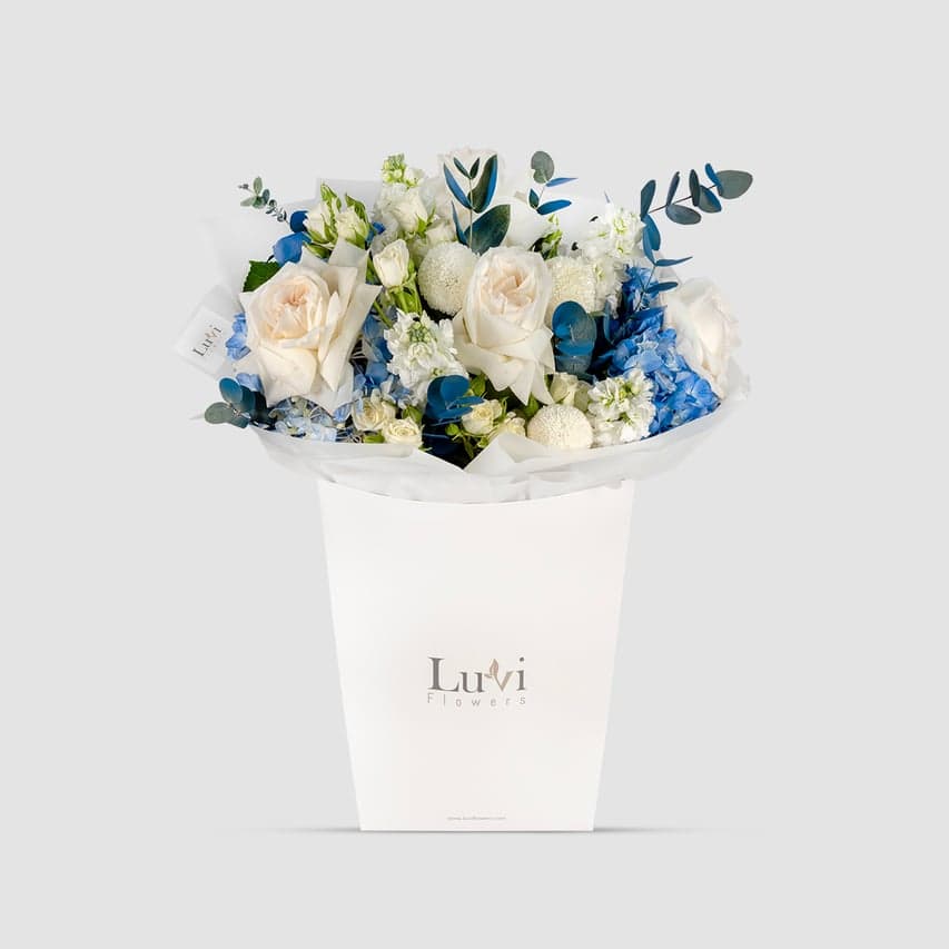 Peaceful Grace bouquet serenely presented in a Luviflowers tranquil gift bag	
