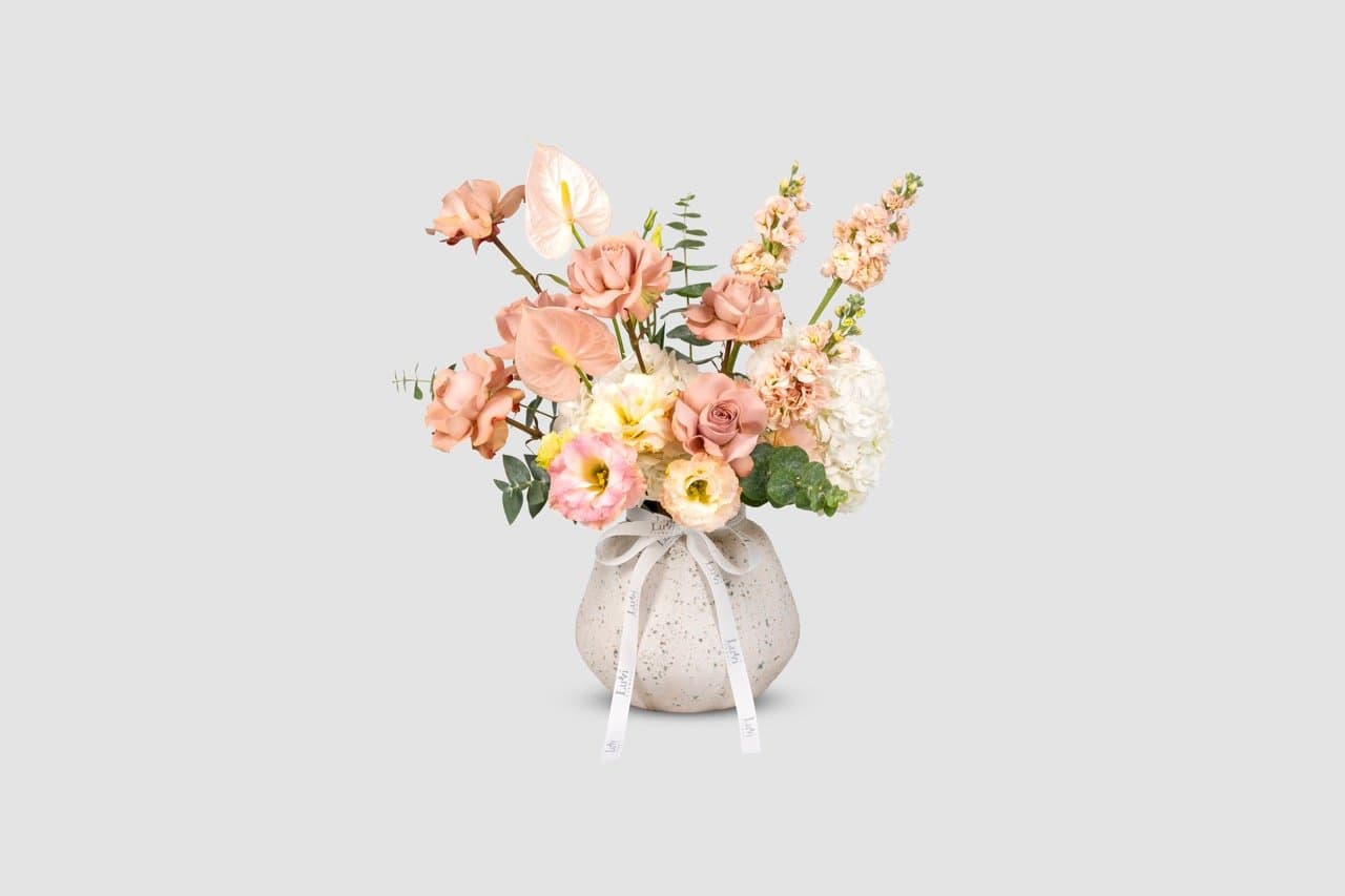 Medium Heartfelt Floral vase arrangement with peach and white flowers	