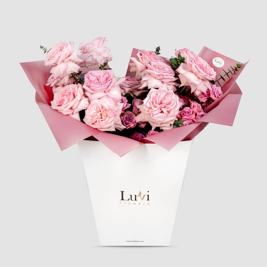  Loving Petals – Dark revival roses, pink carnations, and eucalyptus bouquet.