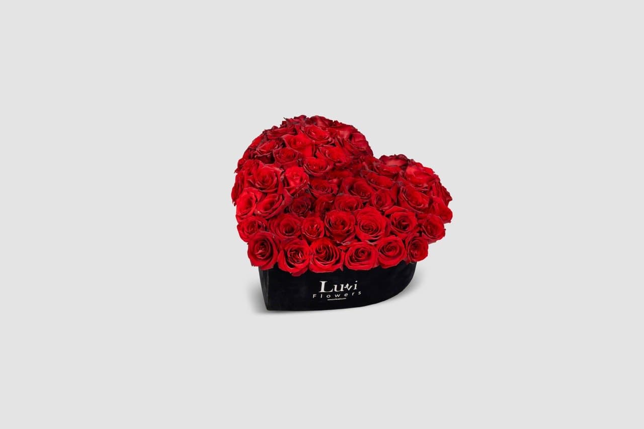 Small Heart's Desire arrangement with red roses	