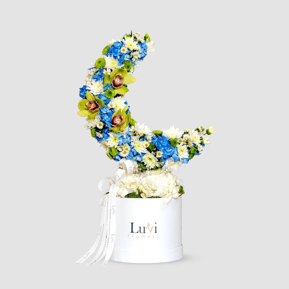 Ramadan Grace arrangement with cymbidium and hydrangeas thumbnail