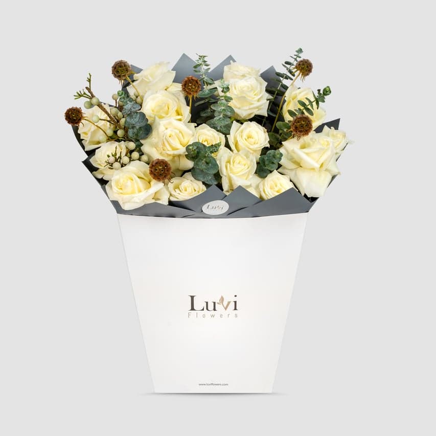 Pure Love – White roses, scabiosa, and eucalyptus bouquet.