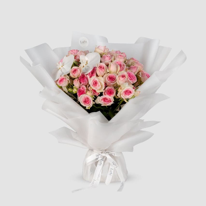 Floral Femme bouquet with pink spray roses.